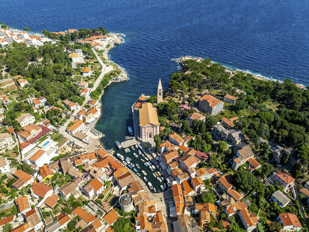 Aerial view of Veli Lošinj old town, church and Adriatic coast